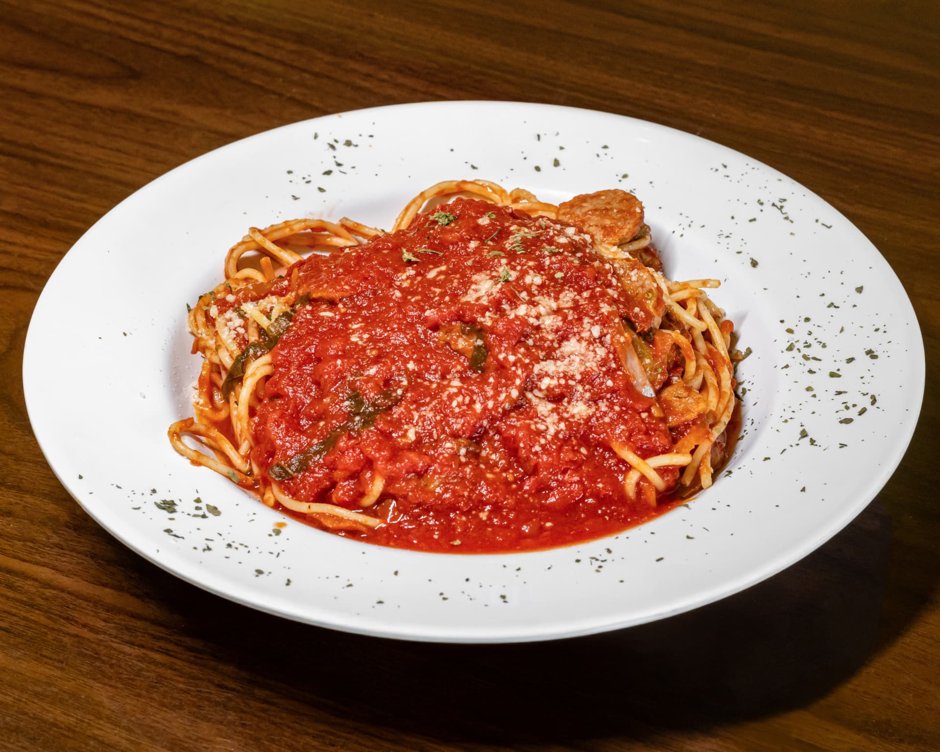 Spaghetti with homemade marinara and sliced sausage